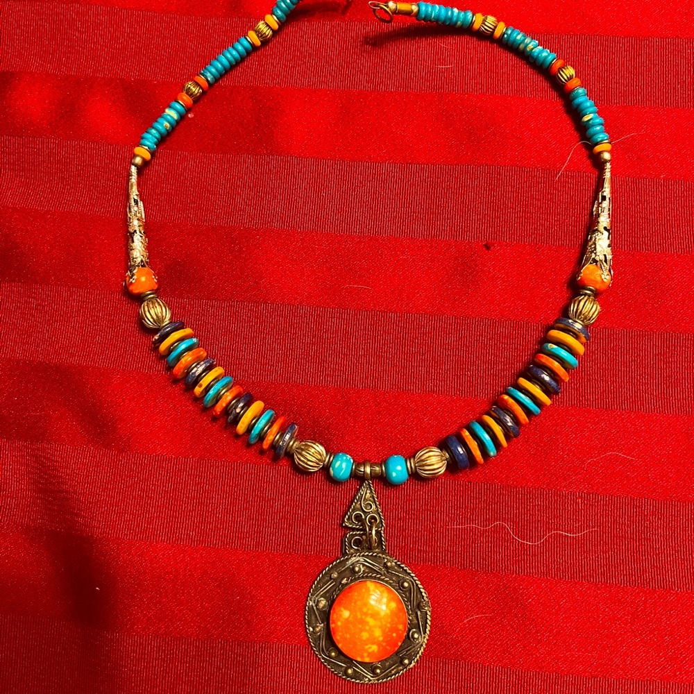 Yak bone necklace handmade in Mongolia.  Center piece 1.5 “.